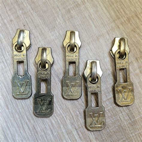 louis vuitton zipper pull repair price|vintage louis vuitton zipper pulls.